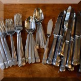 K08. Reed & Barton stainless flatware set. 